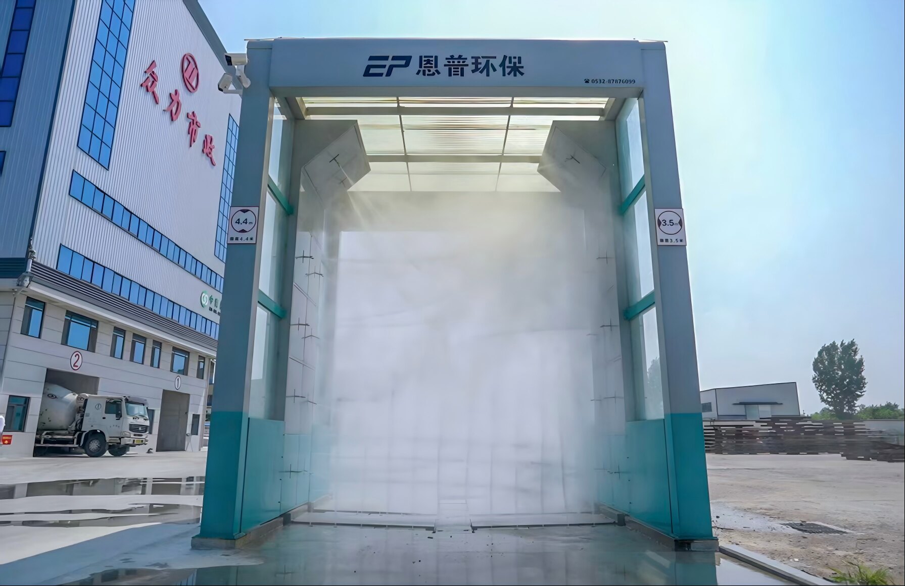 Front view of an Enpu Construction Vehicle Wash System in operation